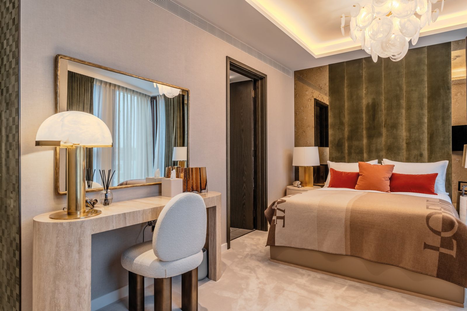 The apartment’s three bedrooms were each designed to radiate a unique character, the first bedroom in the style of retro speakeasies