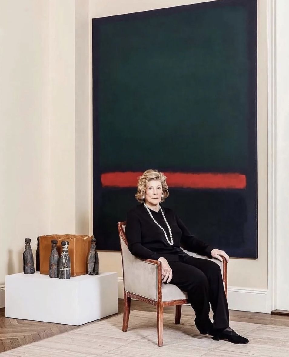Agnes Gund in her New York apartment with Mark Rothko’s ‘Two Greens With Red Stripe’ (1964). Beside her is Christo and Jeanne-Claude’s ‘Wrapped Champagne Bottles’ (1965). (Photo: Instagram/@abstracttrend)