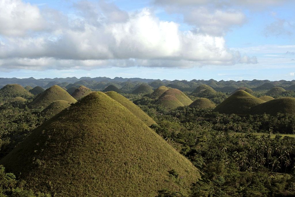 TAGBILARAN, BOHOL, PHILIPPINES - 2008/02/21: The Chocolate Hills on Bohol are named after their chocolate drop-shaped hills extending to the horizon. The color of the hills becomes brownish in the dry season, too.. (Photo by John S Lander/LightRocket via Getty Images)