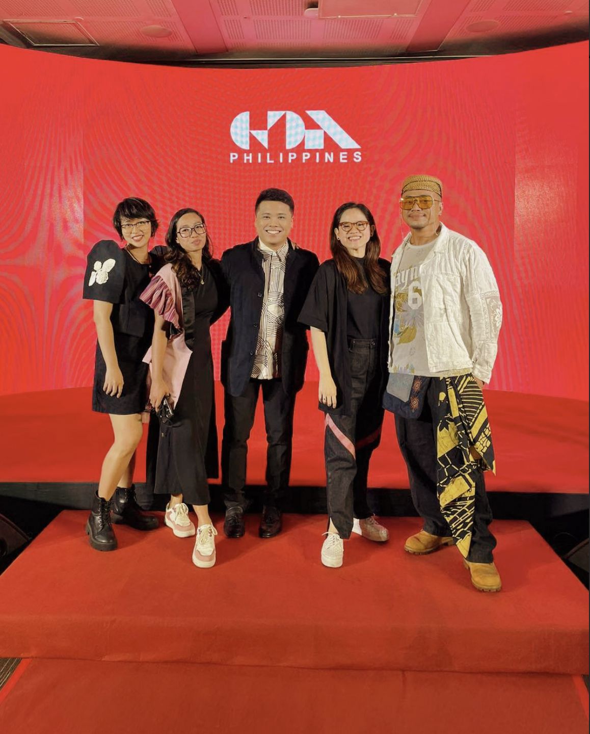 Kae Batiquin of HoliCOW receiving the Good Design Award alongside other Filipino recipients from different categories