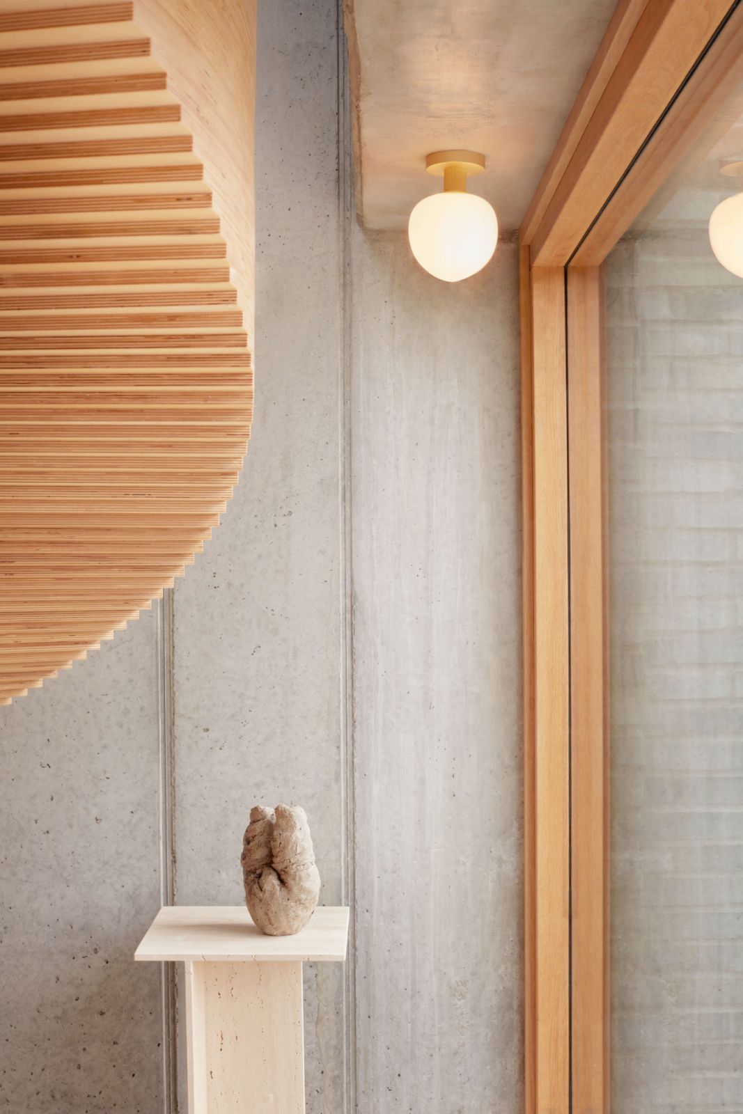 The Lyfa Memoir ceiling light in a brass finish