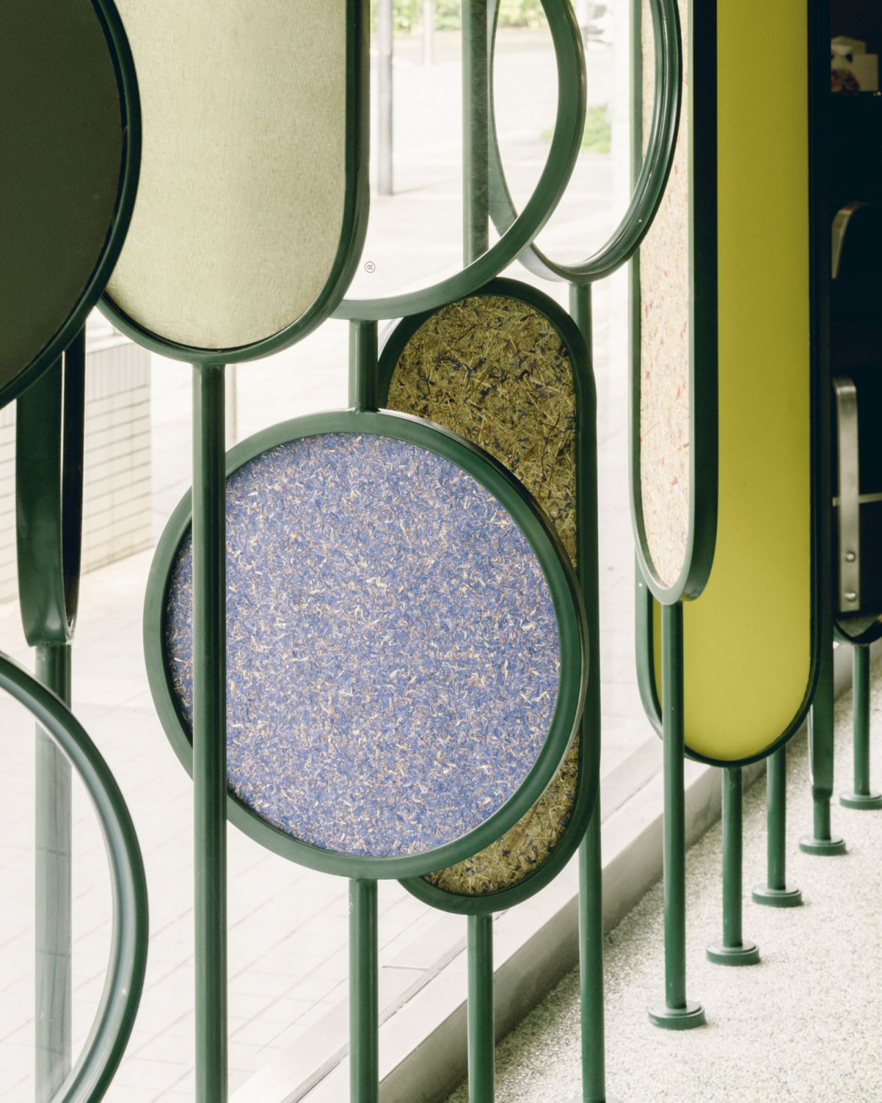 Organoid surfaces made of hay and flower petals, available at Panelogue in Singapore