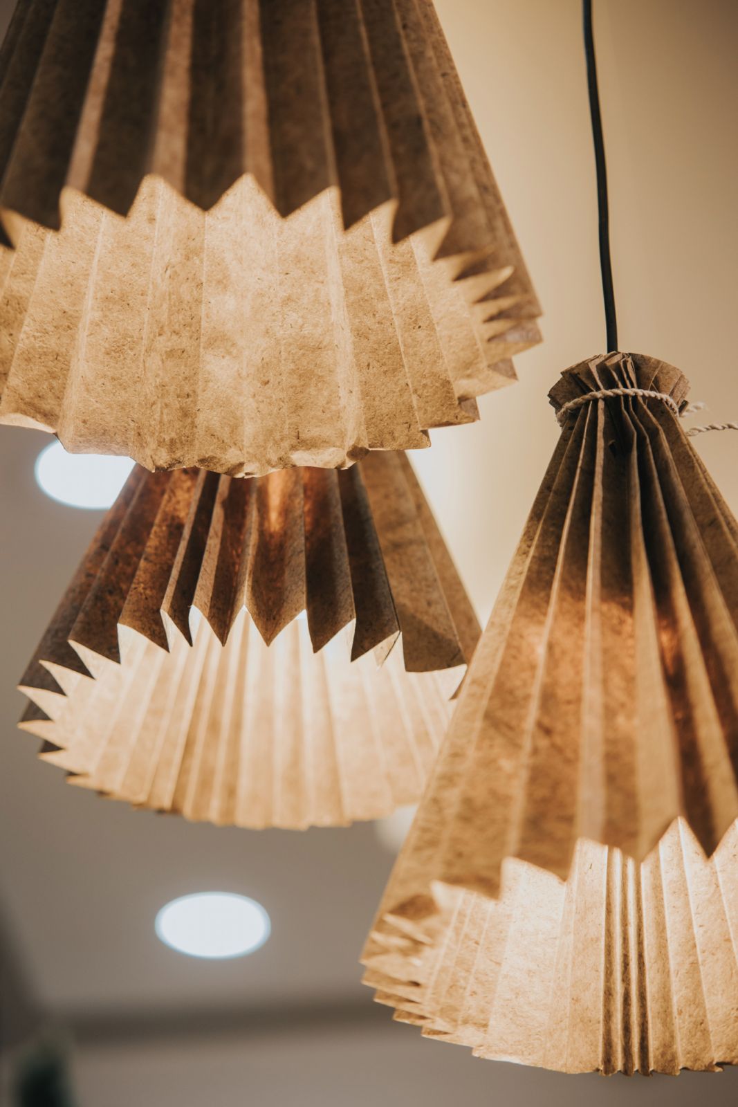 Folding lamps by Clark Mendoza, one of the Pinyapel pineapple-fibre creations