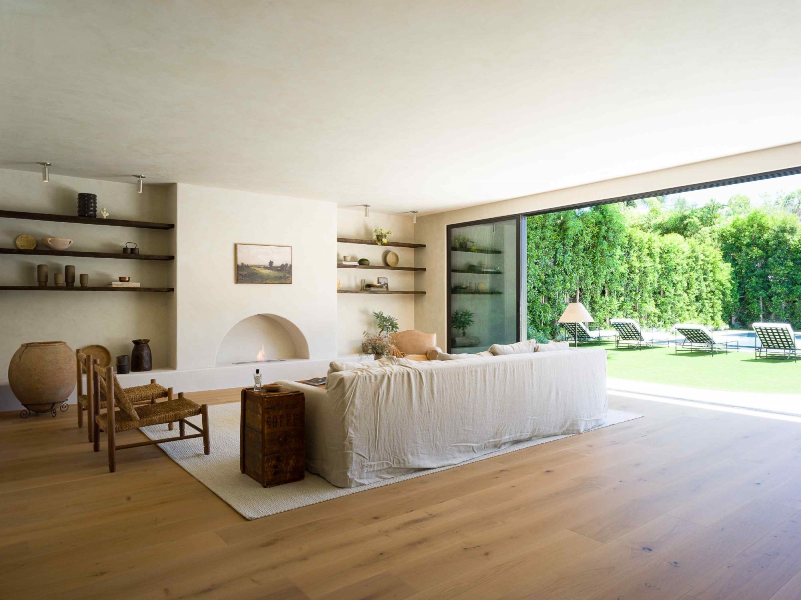 The expansive sliding glass door invites in the lush and light outdoors