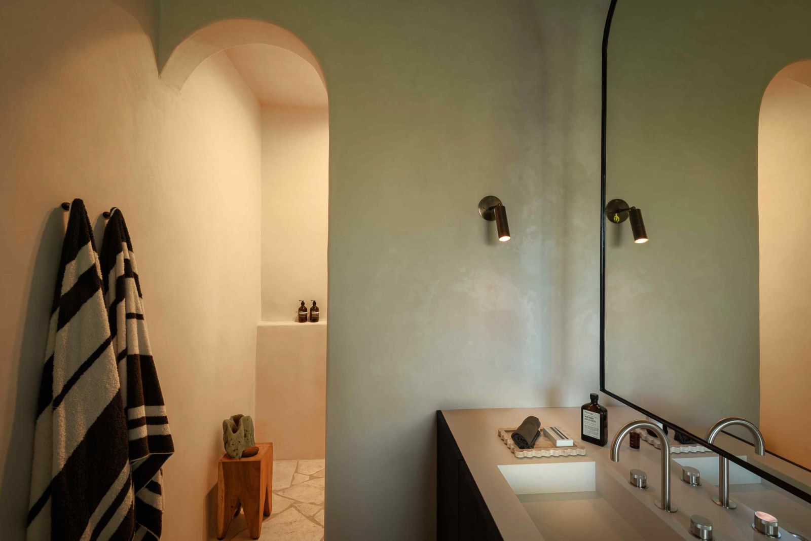 The primary bathroom exudes a spa-like retreat atmosphere