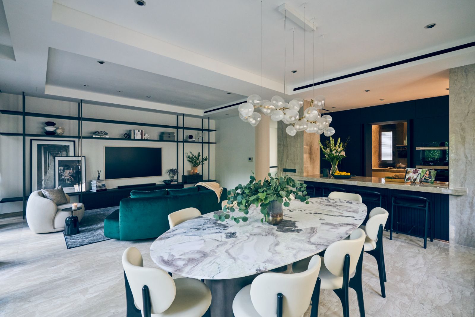 The townhouse’s spacious living room and dining areas are ideal for socialising and culinary explorations