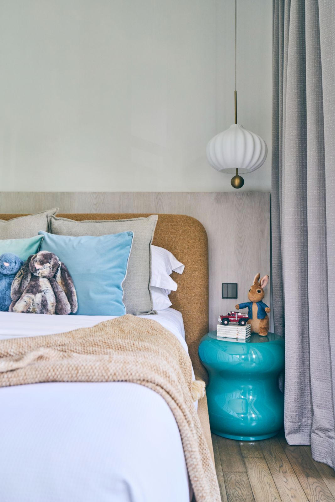 A cosy corner with a sculptural turquoise side table