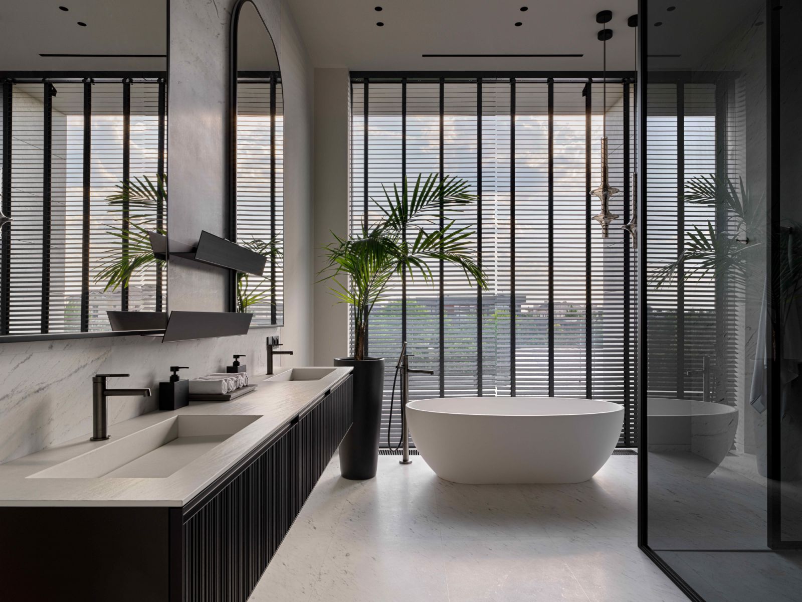 Fior di Bosco marble flooring and a Cielo bathtub in the primary bathroom