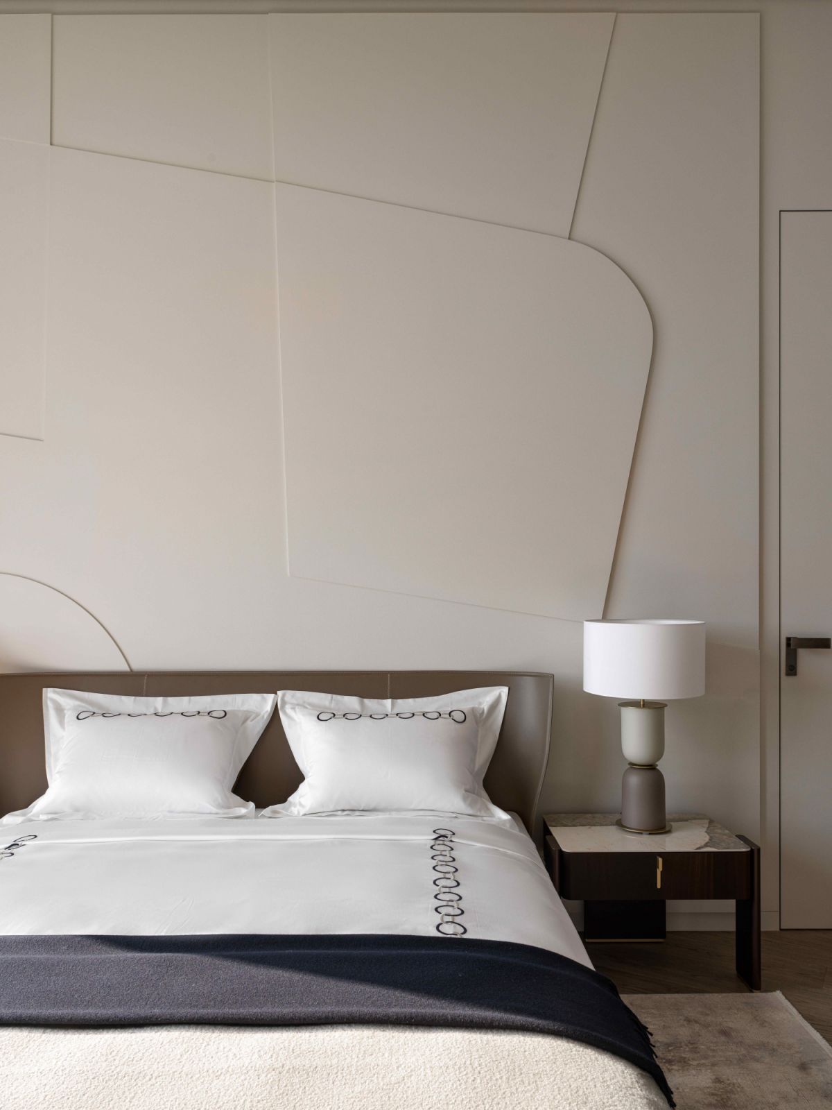 Patterned wooden panels in one of the bedrooms