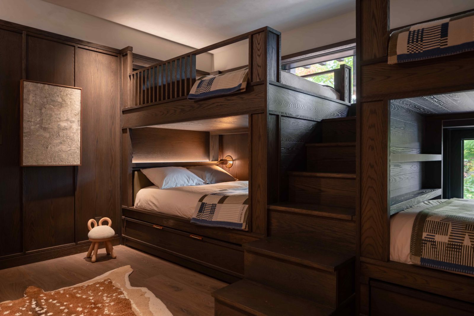 Expert wood craftsmanship in the guest room with bunk beds