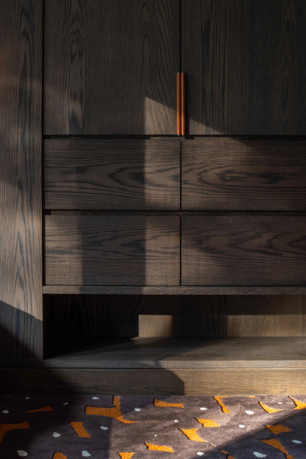 Tempered warmth of wire-brushed smoked oak panels