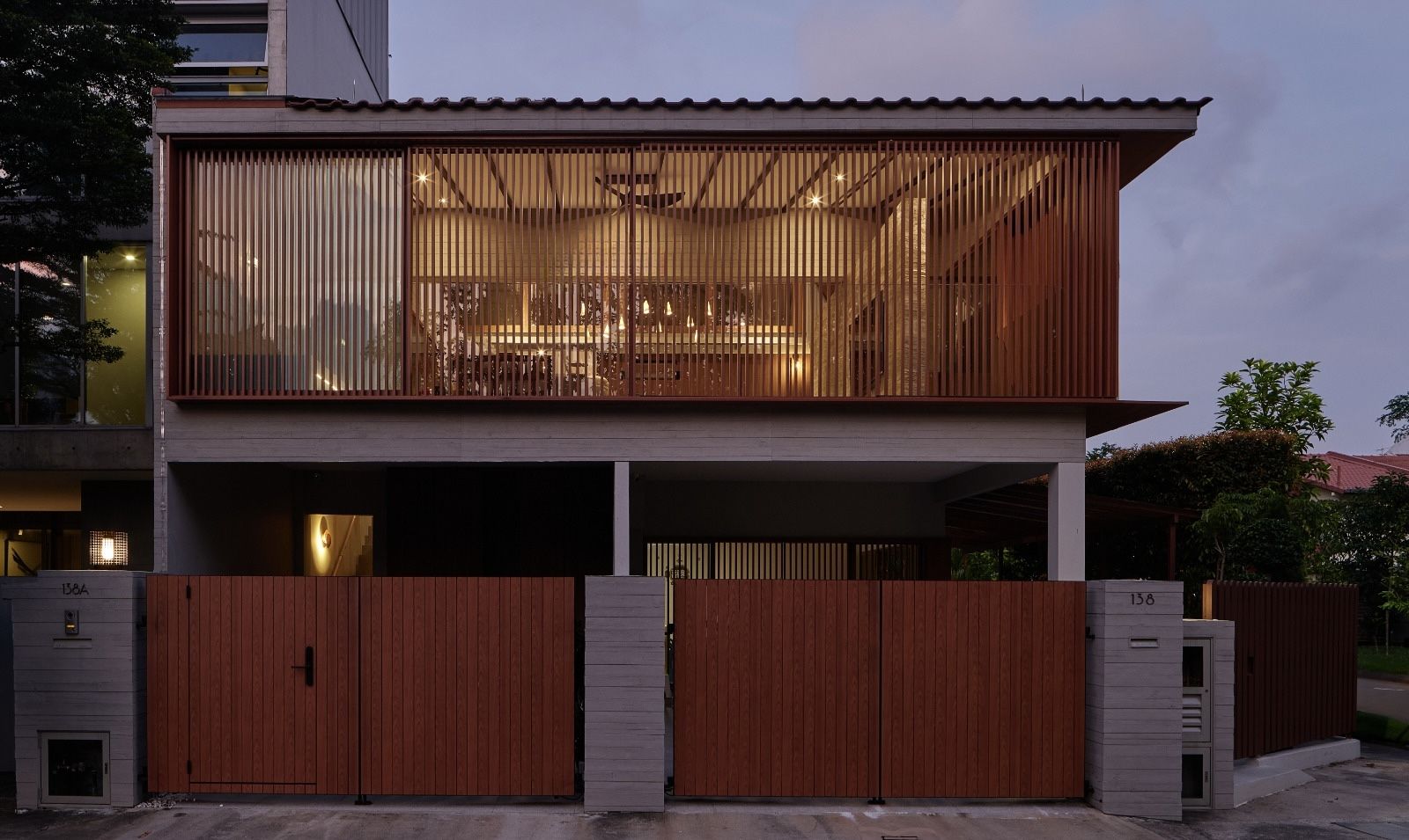 The façade of the home with the screen closed for privacy