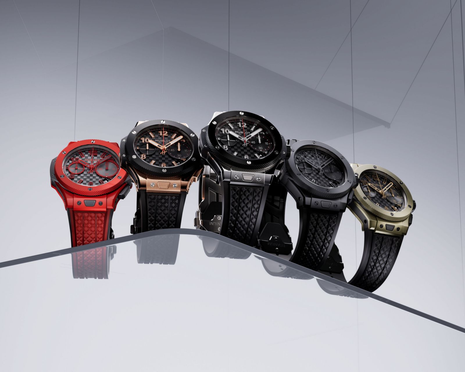 The Hublot Big Bang 20th Anniversary Collection combines emblematic details from the original Big Bang and the newer BIg Bang Unico: (from left) Red Ceramic, King Gold Ceramic, Titanium Ceramic, All Black Ceramic, and Full Magic Gold