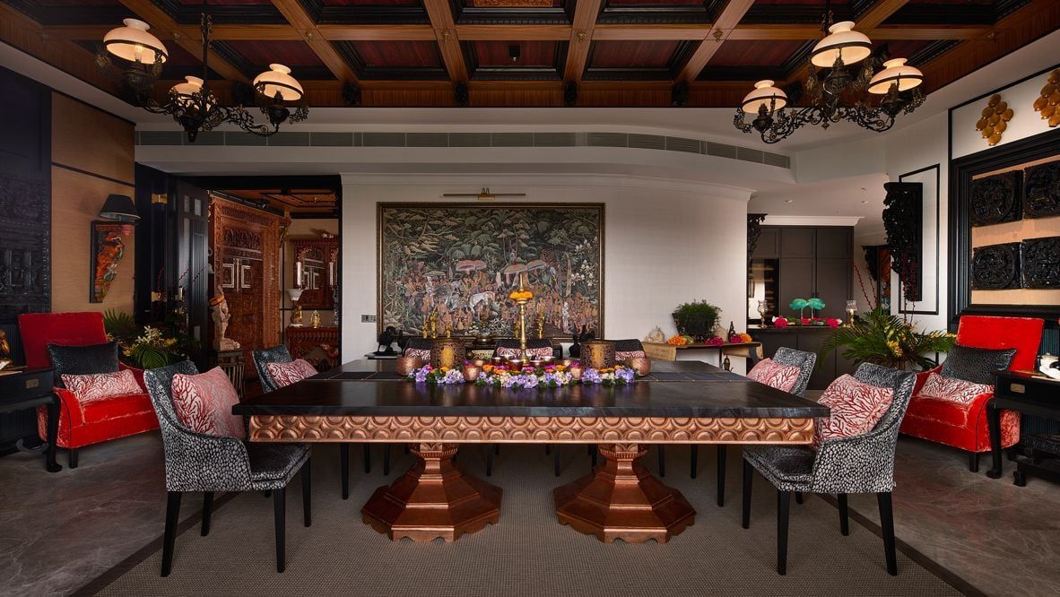 The Keppel Bay condominium by Mosh Interior has a spacious dining area in lieu of a living room, which the designers elevated with wooden details on the ceiling