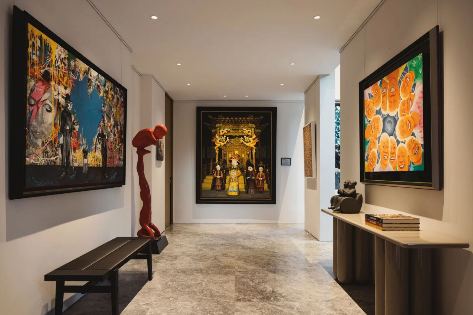 The eclectic art collection helps to define each space, including the foyer