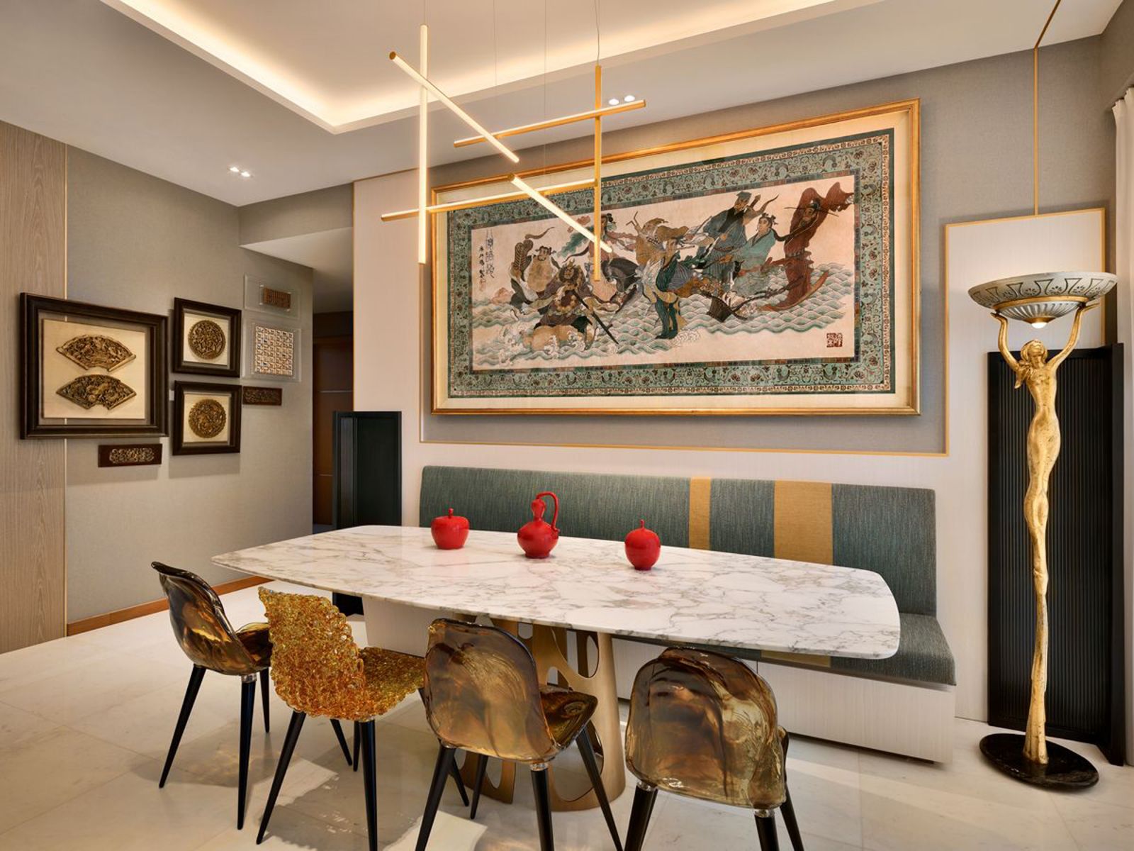 The open-plan dining area with the focal point of a handwoven rug depicting a scene in Chinese mythology, in which the Eight Immortals are embarking on an oceanic odyssey