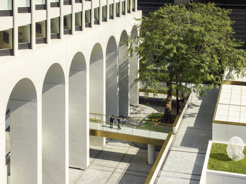 The Murray Hong Kong’s signature archways designed by Foster + Partners, featuring the original 1960s recessed windows and dramatic white facade that were preserved during the transformation from government building to luxury hotel (Photo: The Murray)