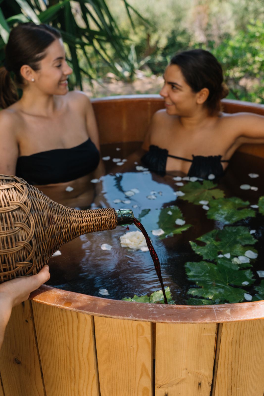 A bath in Cannonau, a Sardinian red wine, is the highlight of the vinotherapy or wine spa