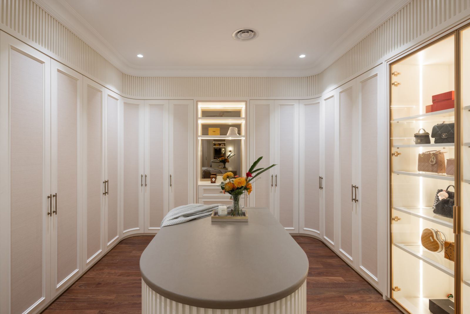The walk-in closet has ample storage - concealed and exposed