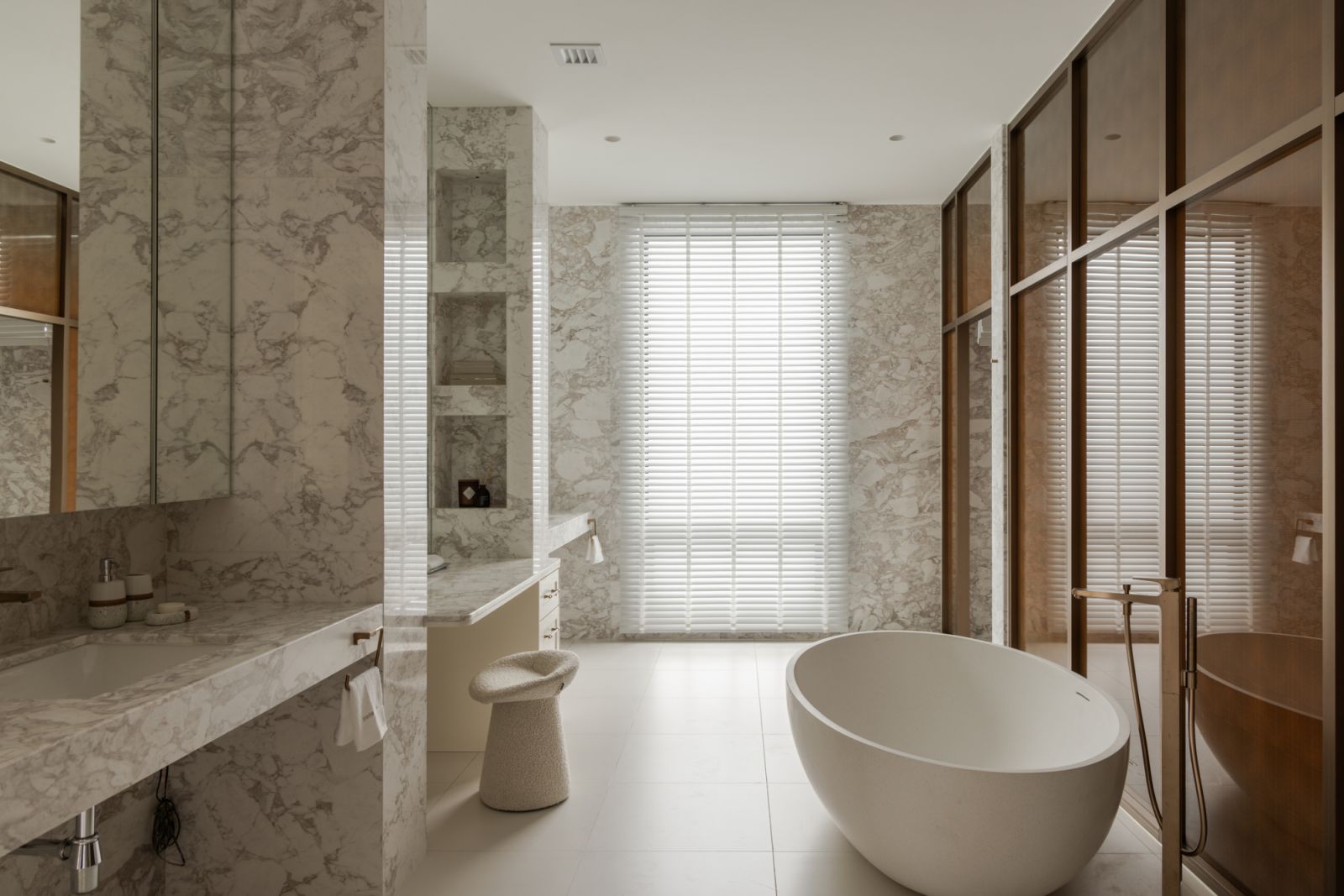 The master bathroom is a sophisticated personal retreat for the homeowners