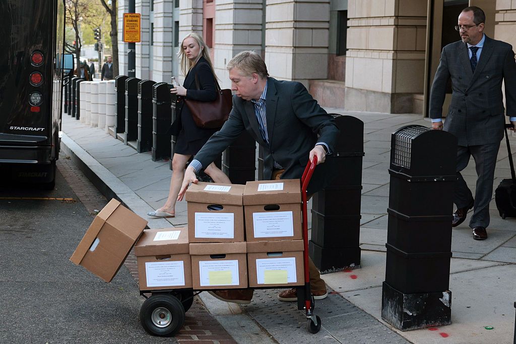 WASHINGTON, DC - APRIL 16: Boxes labeled "Federal Trade Commission v. Meta Platforms, Inc." are brought out from the E. Barrett Prettyman United States Court House on April 16, 2025 in Washington, DC. CEO Mark Zuckerberg was dismissed after testifying for the third day in a row in the U.S. Federal Trade Commission's antitrust trial against Meta over the company's acquisitions of Instagram and WhatsApp and allegations that the company holds a monopoly over the social networking marketplace. (Photo by Alex Wo