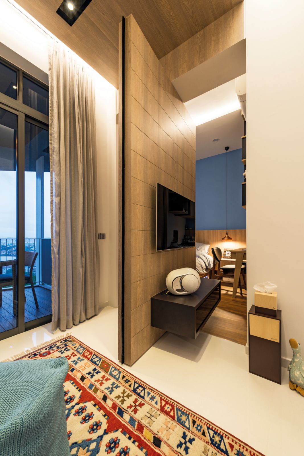 This apartment hides a secret door behind the TV, the entrance to the bedroom revealed when it rotates on its centre