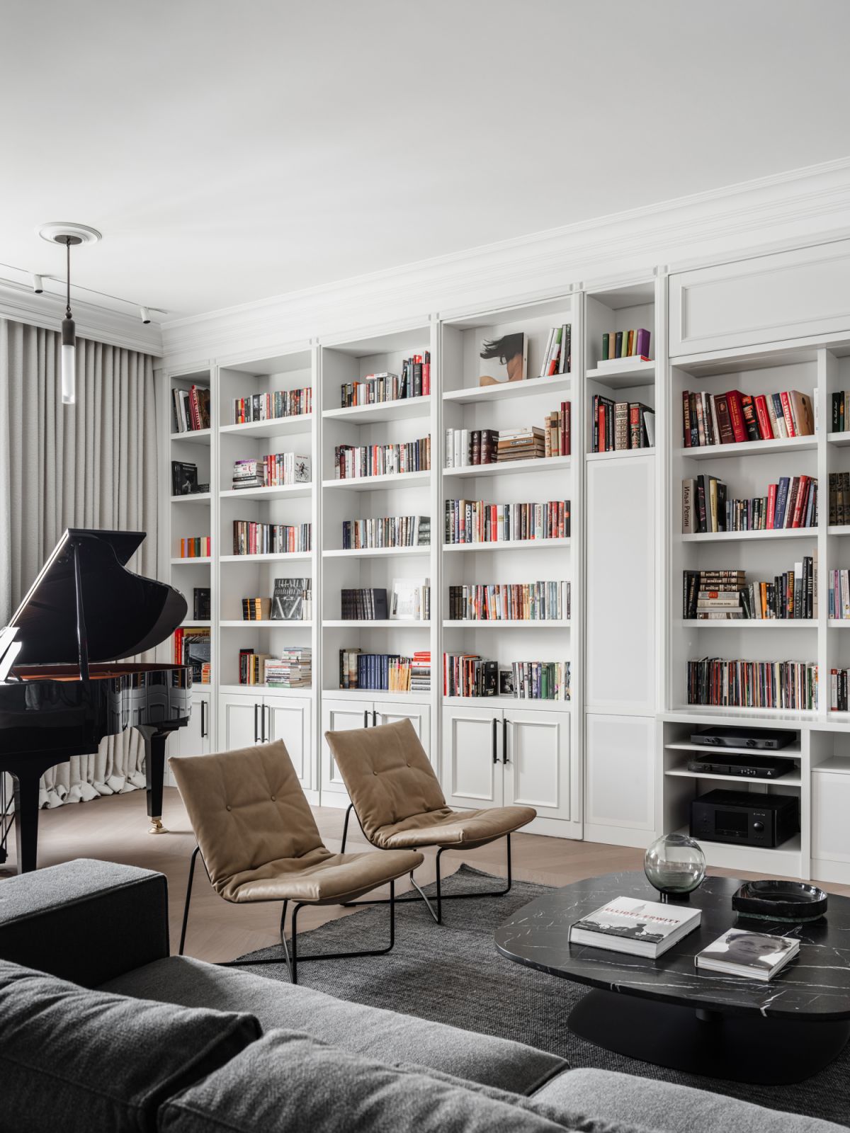 When the entrance is closed, it blends in seamlessly with the library shelves