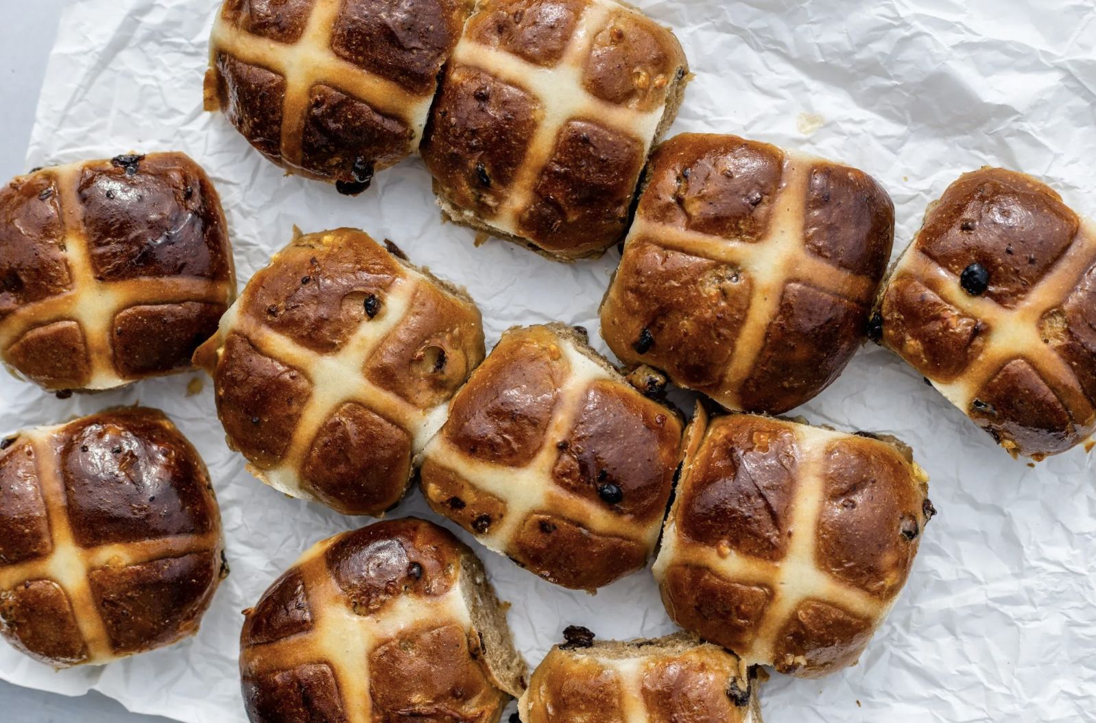 Hot cross buns, a vessel that brings centuries of layered history to your plate (Image: Bell Bird Baked Goods)