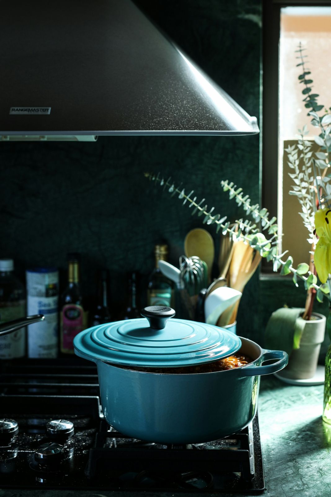 The Le Creuset Dutch oven with its distinctive glossy enamel finish in teal (Photo: Unsplash/Odiseo Castrejon)