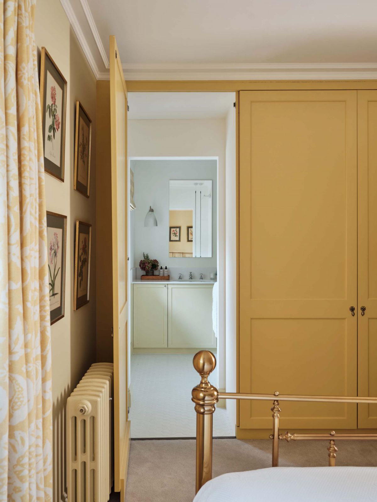 A bedroom in this St Albans, England family home designed by Lucinda Sanford