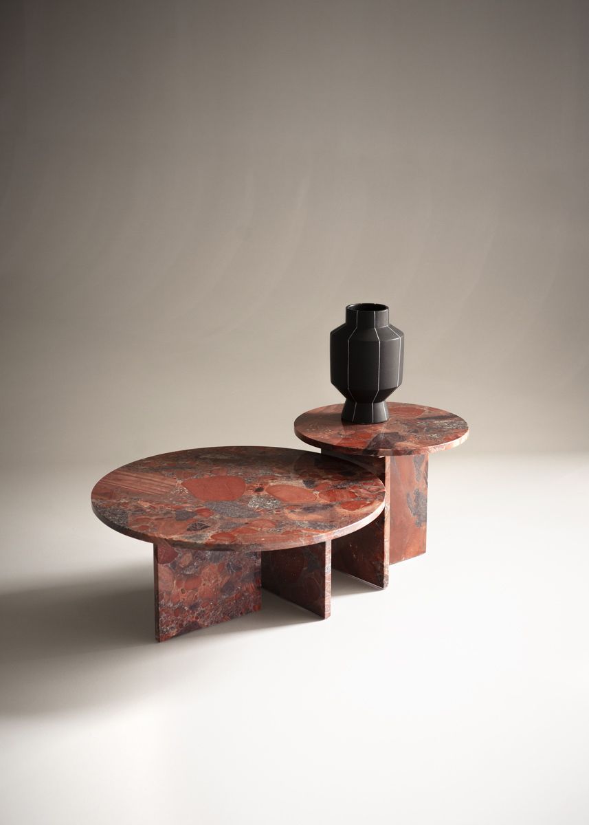 The Tebe collection of low stone coffee tables by Baxter is a tribute to nature and its ability to transform itself into a practical masterpiece