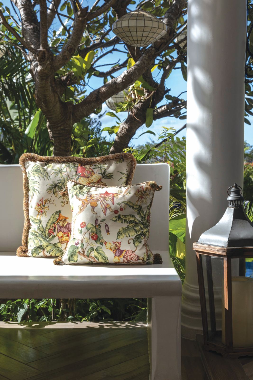 Thick cushions and throw pillows allow people to stay in the lanai all day