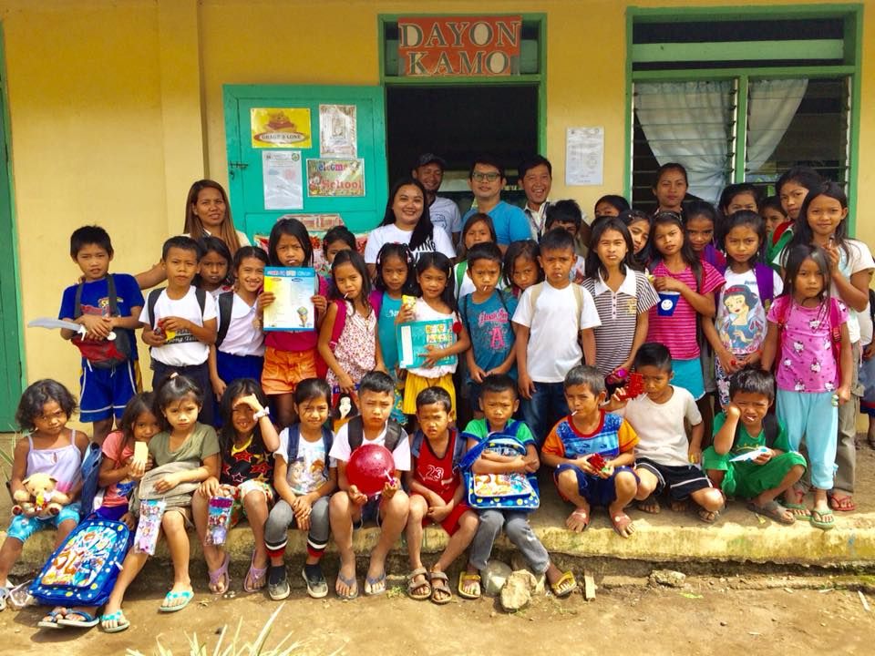 Elizabeth Quijano with members of the Blaan indigenous community