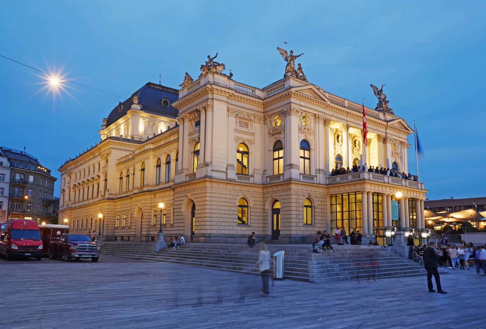 Operahaus Zurich and architecture along North shore of Lake Zurich at dusk, it has been home of Zurich Opera since 1891.
