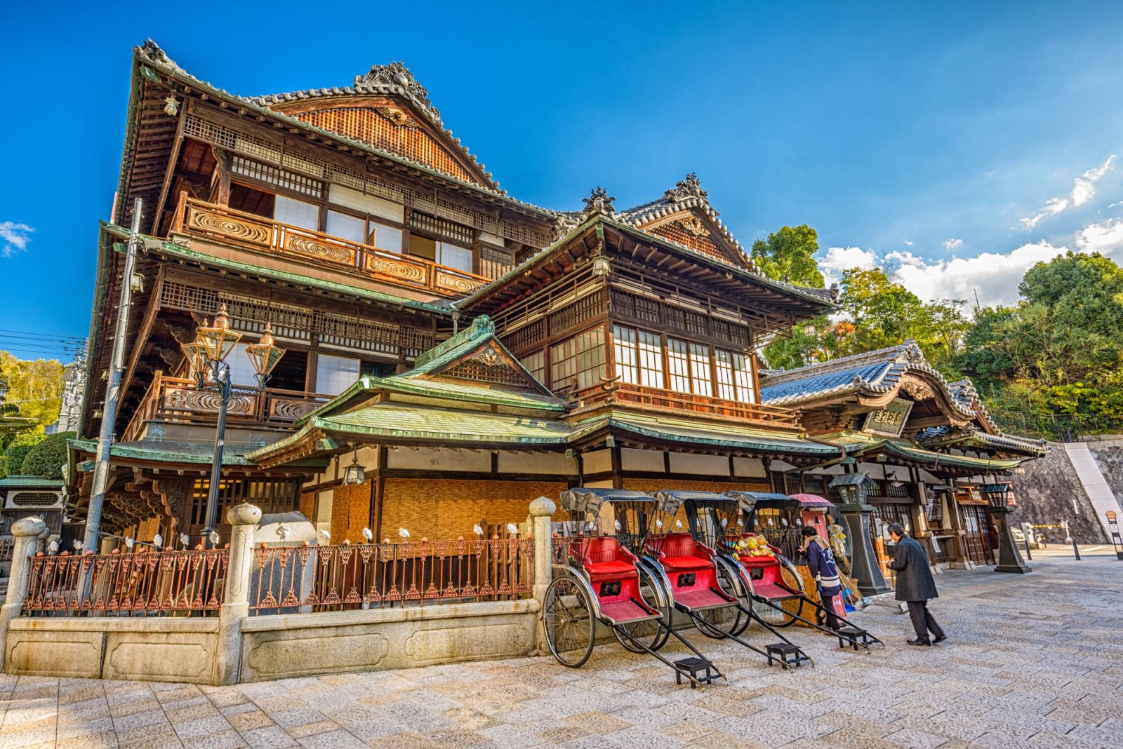 MATSUYAMA, JAPAN - DECEMBER 3, 2012: Workers at Dogo Onsen bath house. It is one of the oldest bath houses in the country.