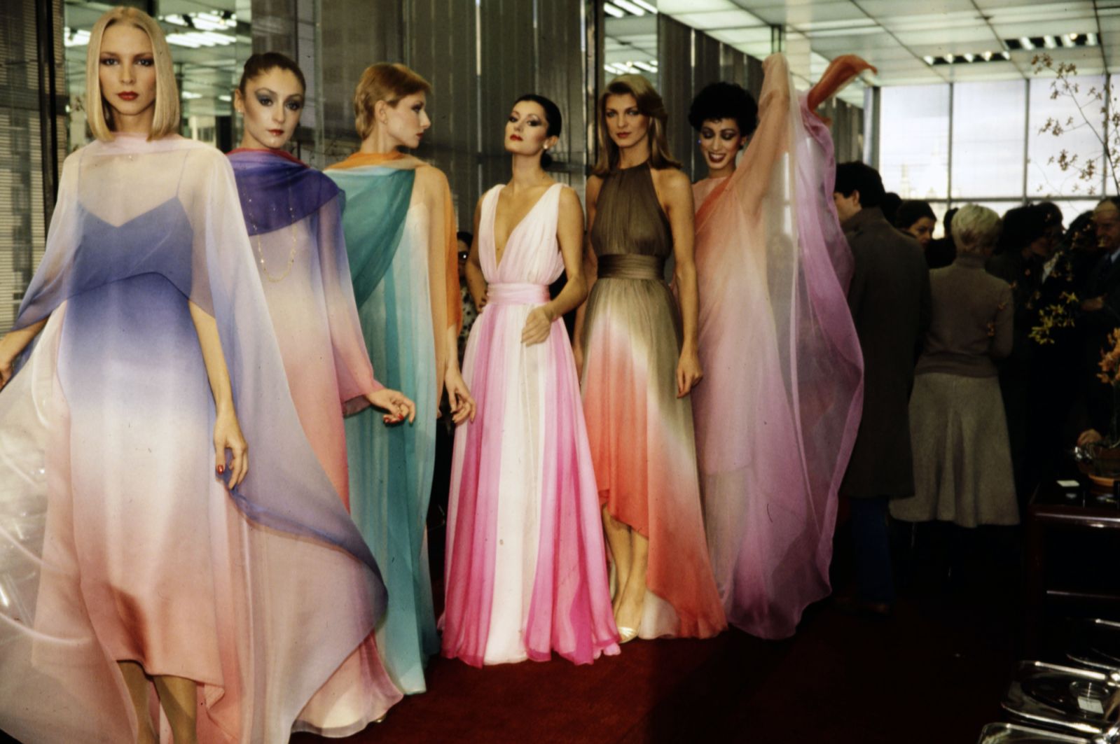 Models Karen Bjornson, Connie Cook, Carla Araque, Nancy Grigor, and Pat Cleveland in ombre chiffon dresses from Halston's Spring 1979 Made-to-Order Collection (Photo: Getty Images)