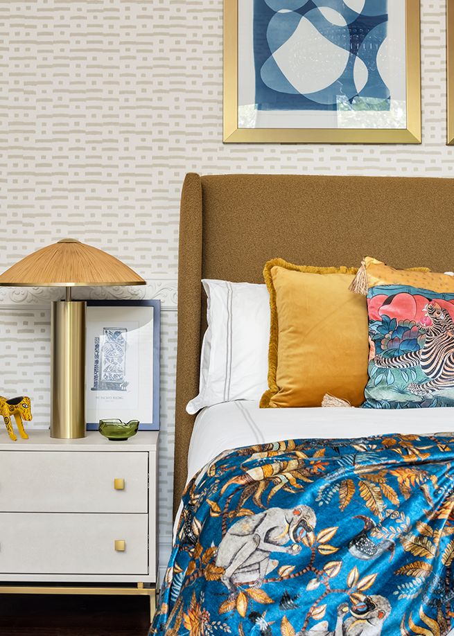 Bold jewel tones and silky textures in a bedroom designed by mr alex TATE