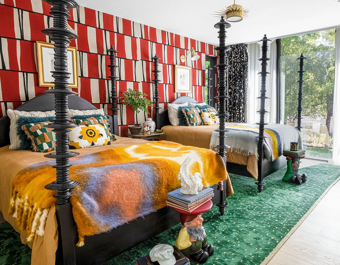 Unexpectedly bold colours used in a bedroom by mr alex TATE design
