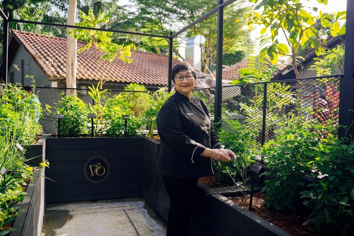 Violet Oon at the new restaurant's mini herb garden (Photo: Violet Oon Restaurant)