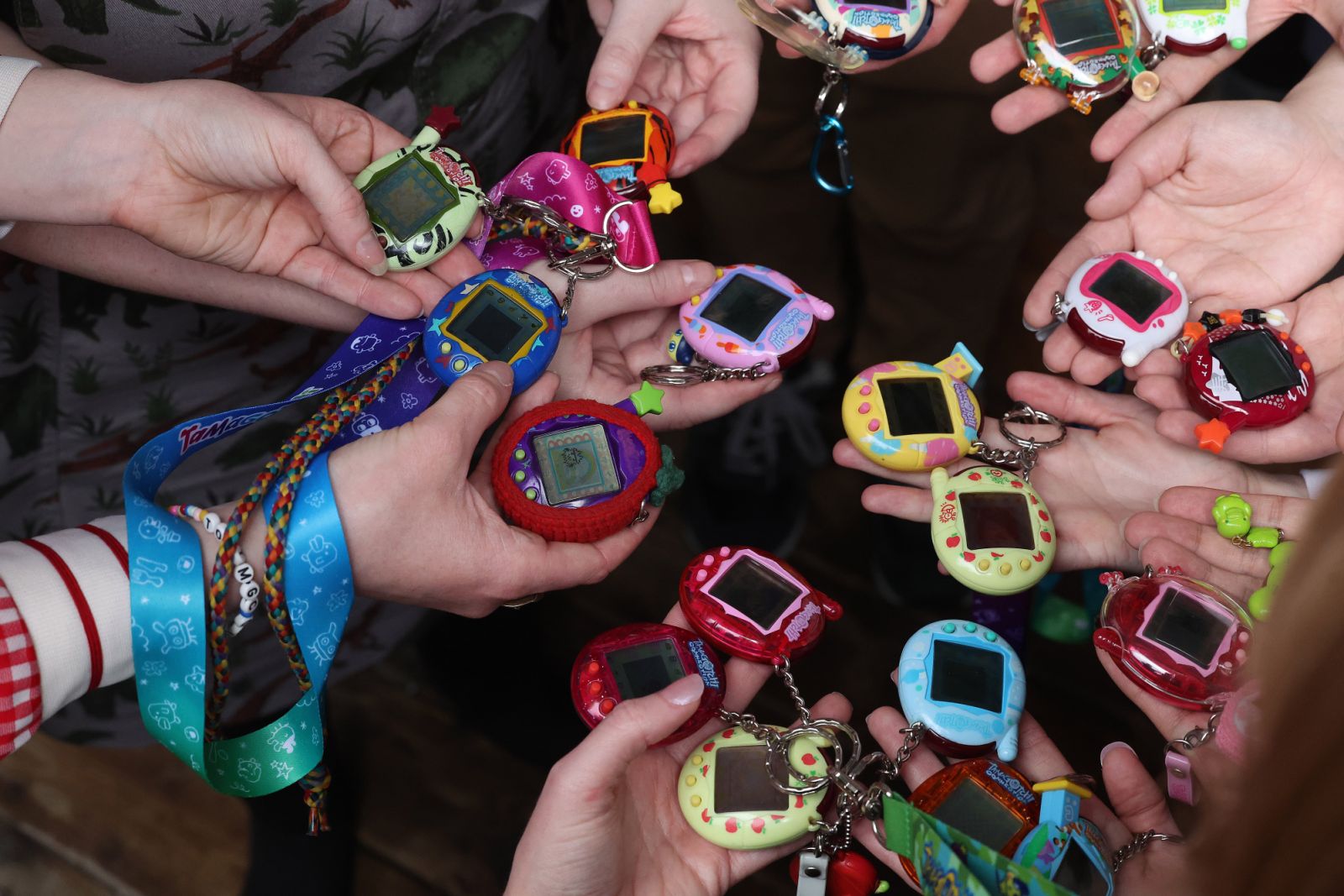 TORONTO, ON- APRIL 28  -   Toronto's Tamagotchi Club hosts the first of many meetups the club hosts annually in Toronto. April 28, 2024. The Tamagotchi is a handheld digital pet that was created in Japan in Japan in 1996. Oddly enough as the Province of Ontario bans cell phones in class Tamagotchi was banned in class at its height Steve Russell/Toronto Star        (Steve Russell/Toronto Star via Getty Images)