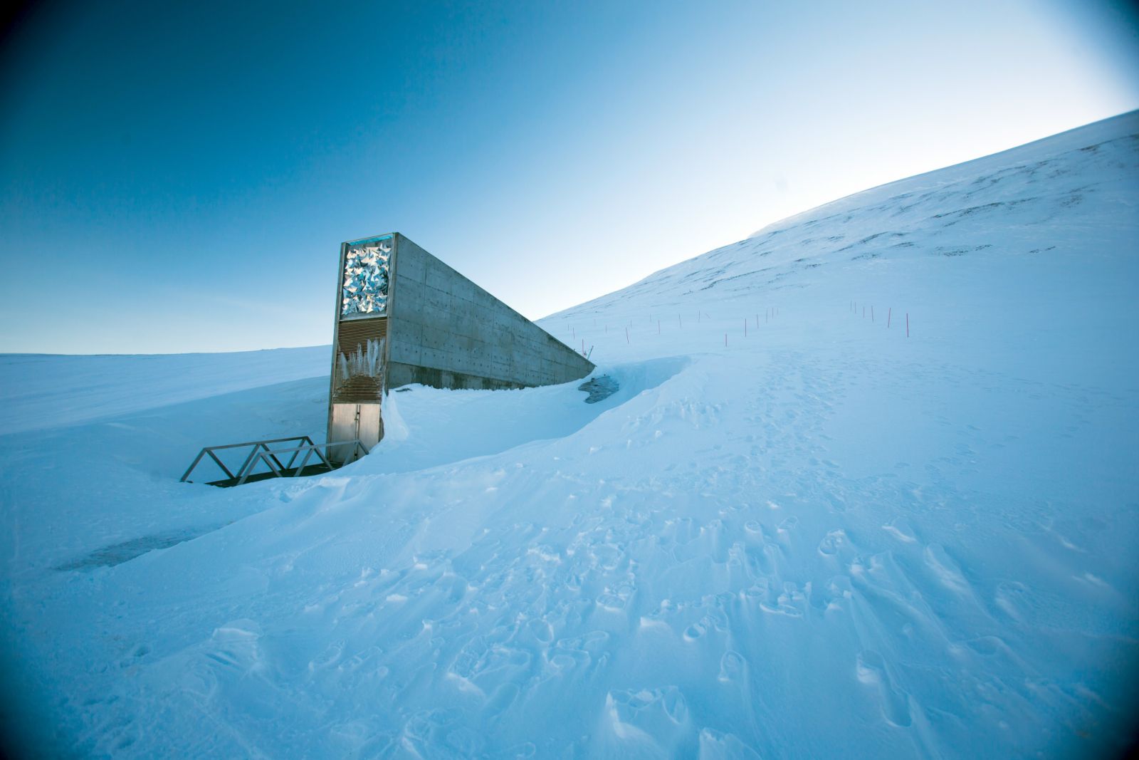 The entrance to the international gene bank Svalbard Global Seed Vault (SGSV) near Longyearbyen on Spitsbergen, Norway, 08 April 2015. During permafrost, the germs of more than four million plants such as rice, corn, beans, and potatoes are collected, frozen, and secured for the future in three mountain caves. Photo: Jens Büttner | usage worldwide (Photo by Jens Büttner/picture alliance via Getty Images)