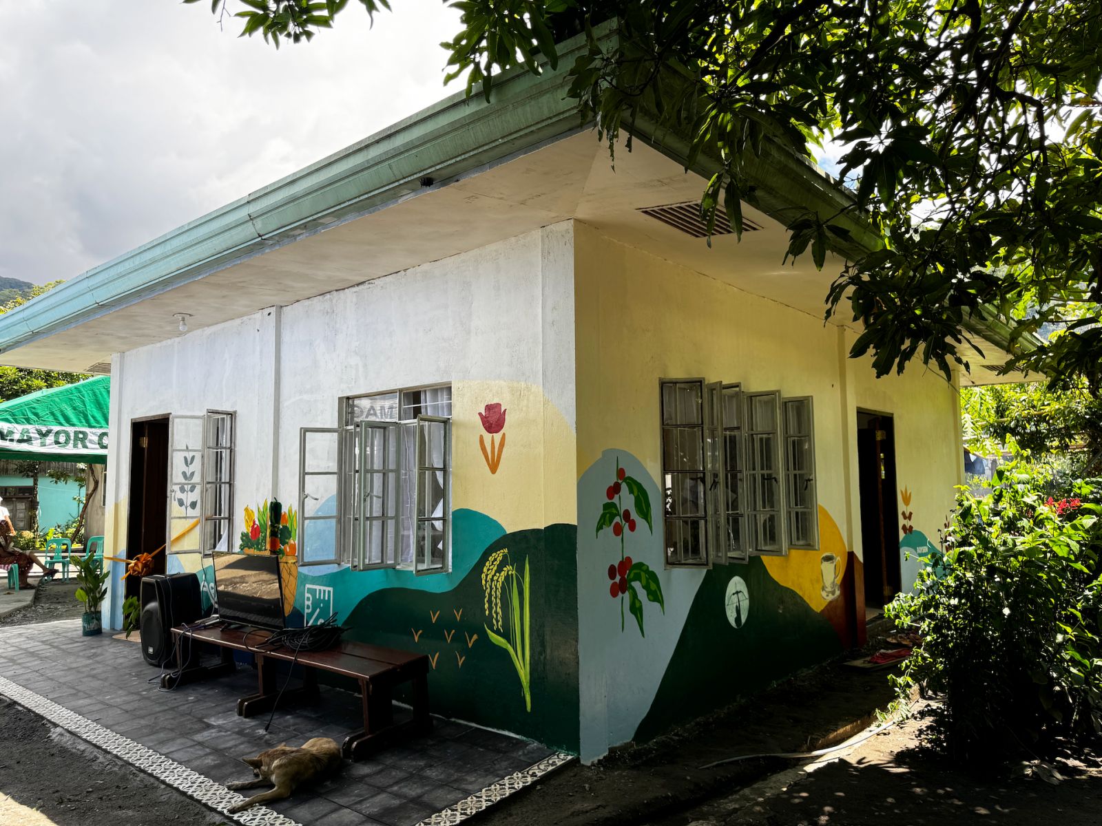 The mural on the façade of this Benilde-designed senior home encapsulates the life of the Magsilay community, from farming to their love for coffee