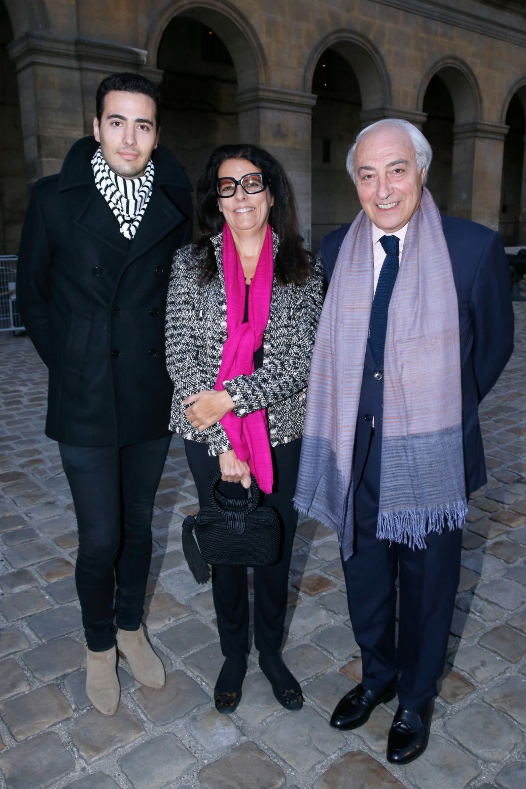 PARIS, FRANCE - SEPTEMBER 08: Francoise Bettencourt Meyers standing between her husband Jean-Pierre Meyers and their son Jean-Victor Meyers attend 'La Traviata' - Opera en Plein Air, produced by Benjamin Patou, 'Moma Group'. Held at Hotel Des Invalides on September 8, 2015 in Paris, France. (Photo:Getty Images)