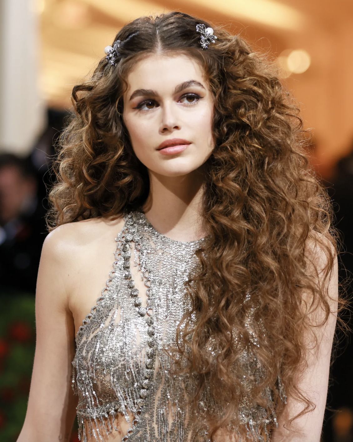 Kaia Gerber wears Alexander McQueen with hair styled by Guido Palau to the 2019 Met Gala (Photo: Getty Images)