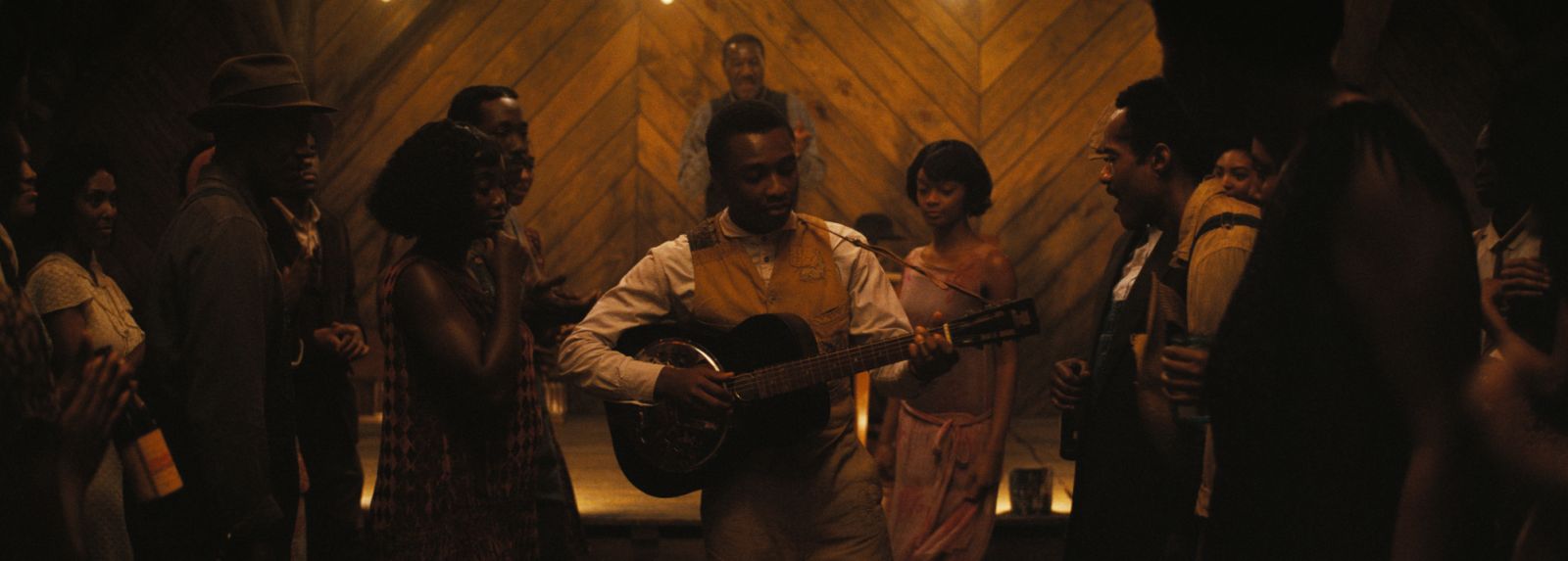 Miles Caton as Sammie with his guitar in the juke bar (Photo: Courtesy of Warner Bros)