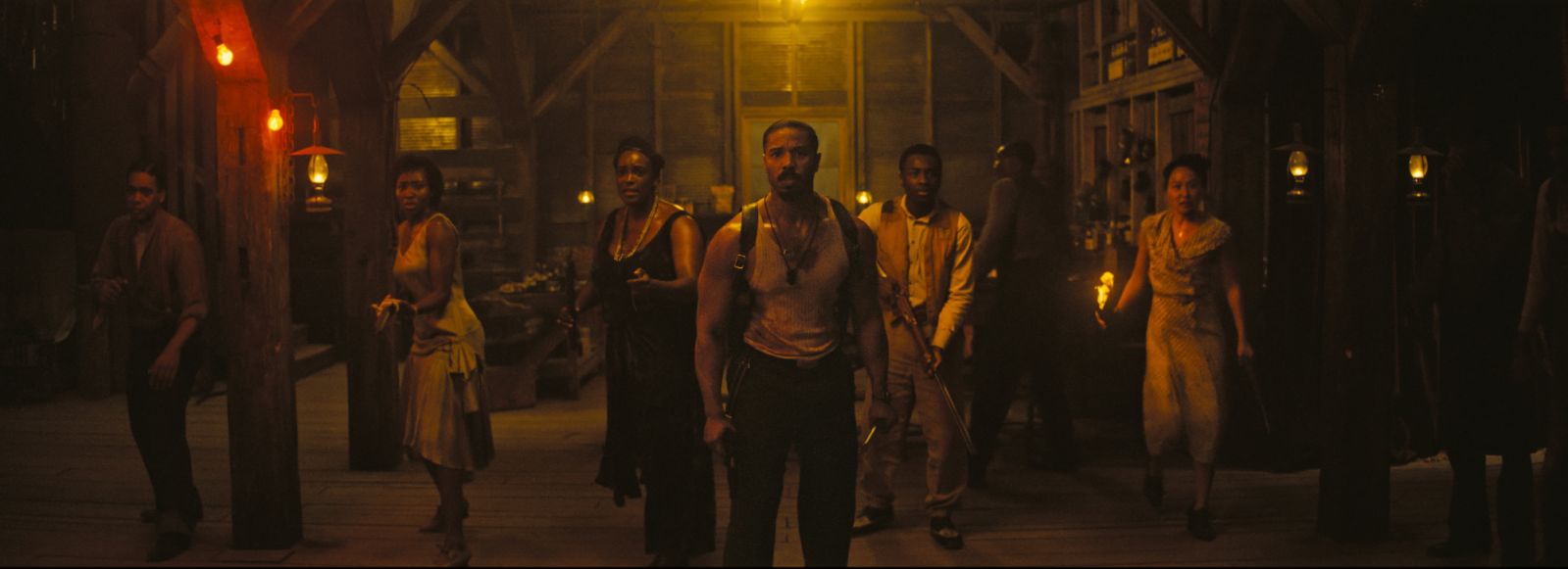The cast of ‘Sinners’ making their last stand in the juke bar (Photo: Courtesy of Warner Bros)