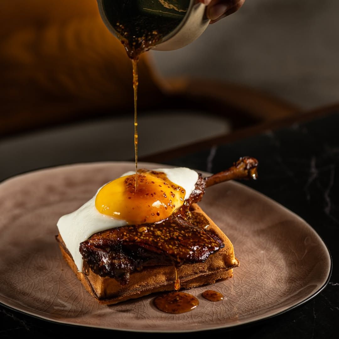 Duck and Waffle at Rhea (Image: @rhea.dining)