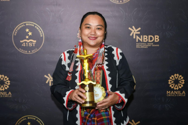 Indigenous creative writer Elizabeth Quijano receiving the award for ‘Best Book of Short Fiction in Binisaya’ at the 41st National Book Awards