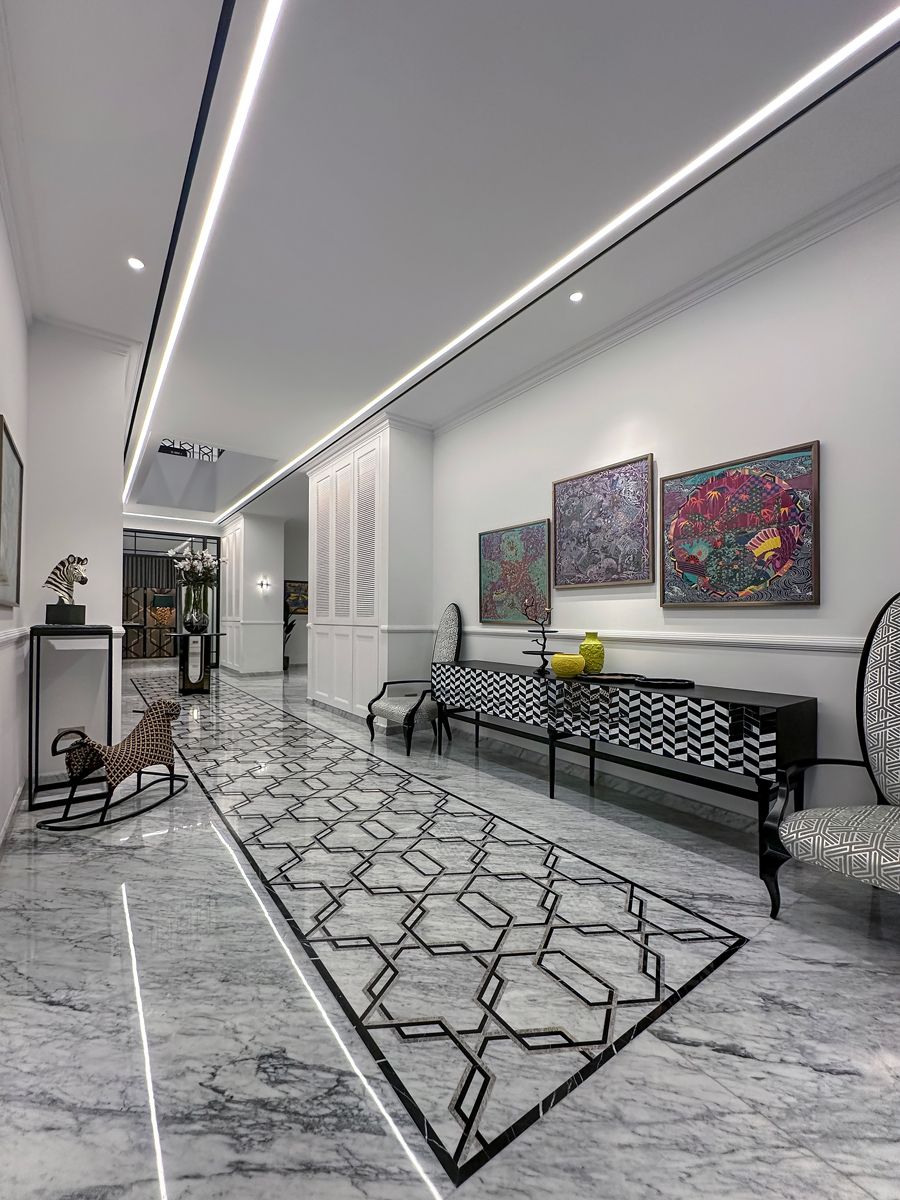 The stately corridor sets the tone at this landed house
