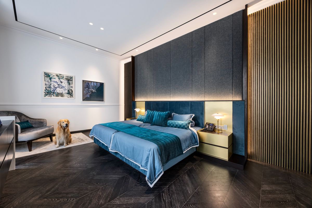 The landed home's resident pet golden retriever Wally, inside the tranquil bedroom